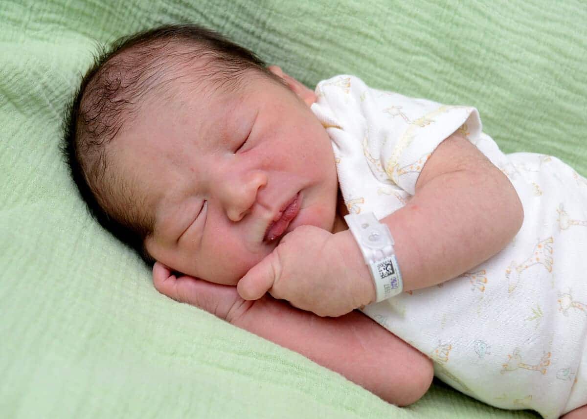 close up shot of james in the hospital bed