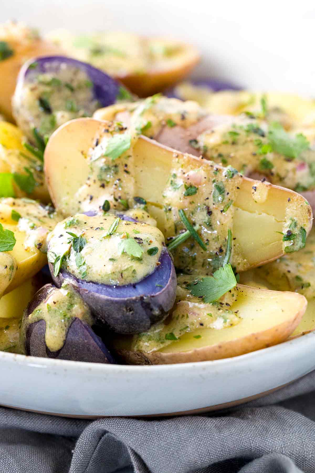 Purple And Gold Fingerling Potatoes With Homemade Herb Vinaigrette Dressing Purple And Gold Fingerling Potatoes With Homemade Herb Vinaigrette Dressing