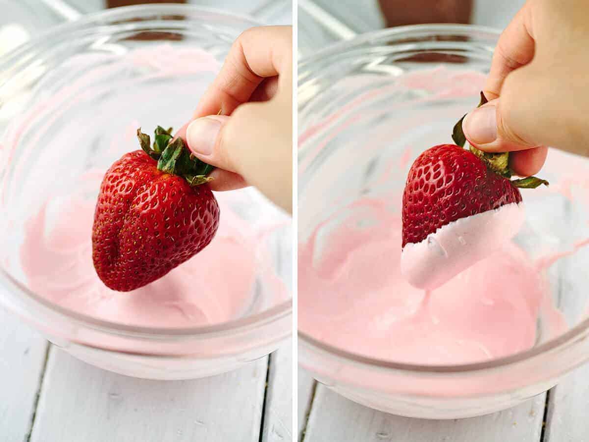 Dipping strawberries into chocolate with red food coloring.