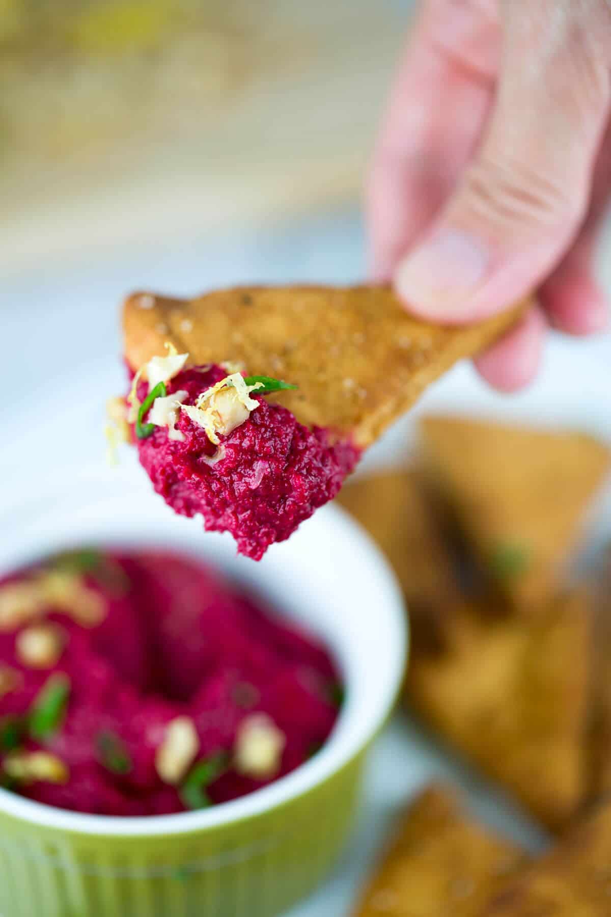Crunchy pita chip with a yummy roasted beet hummus dip.