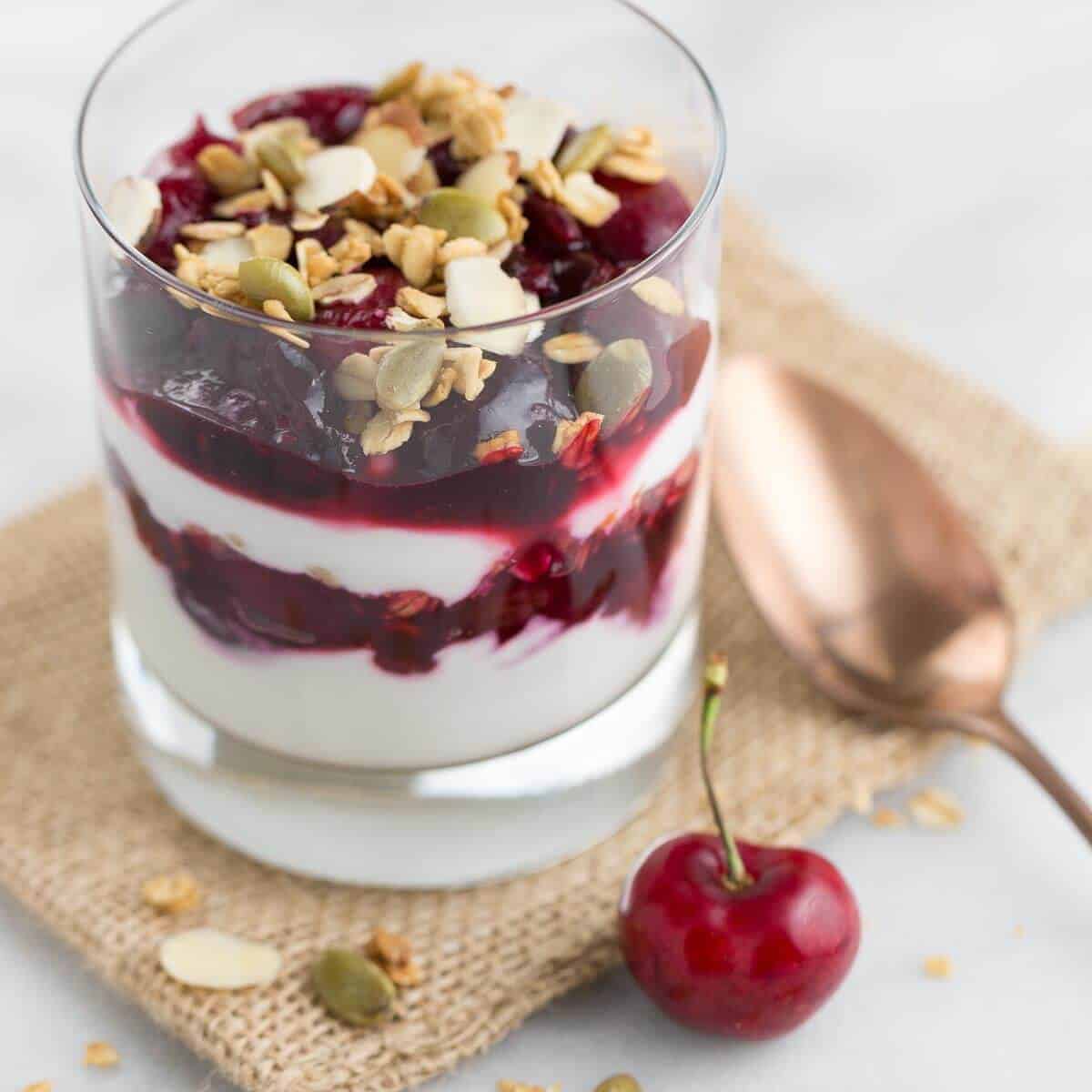 Cherry Yogurt Parfaits Topped with Crunchy Granola 