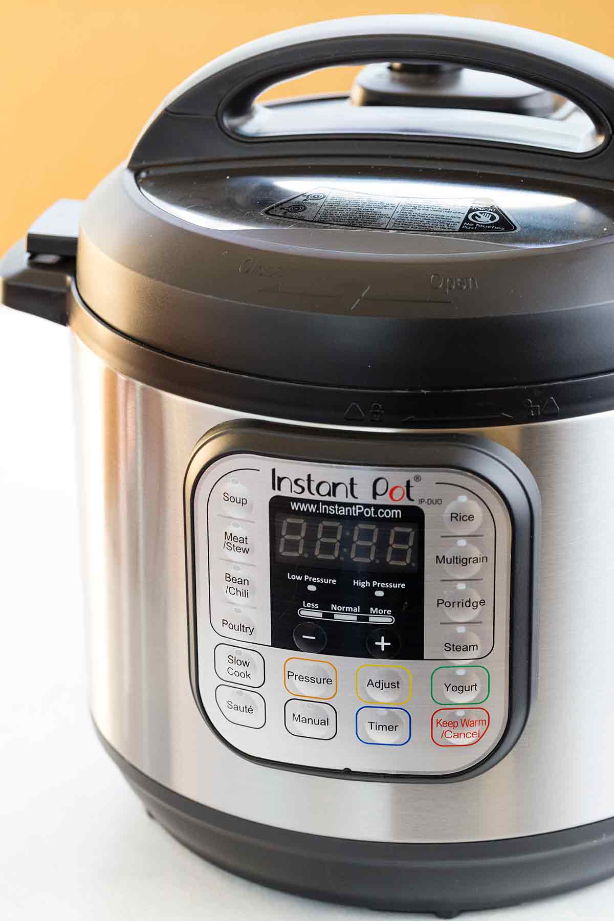Instant Pot pressure cooker on a table.