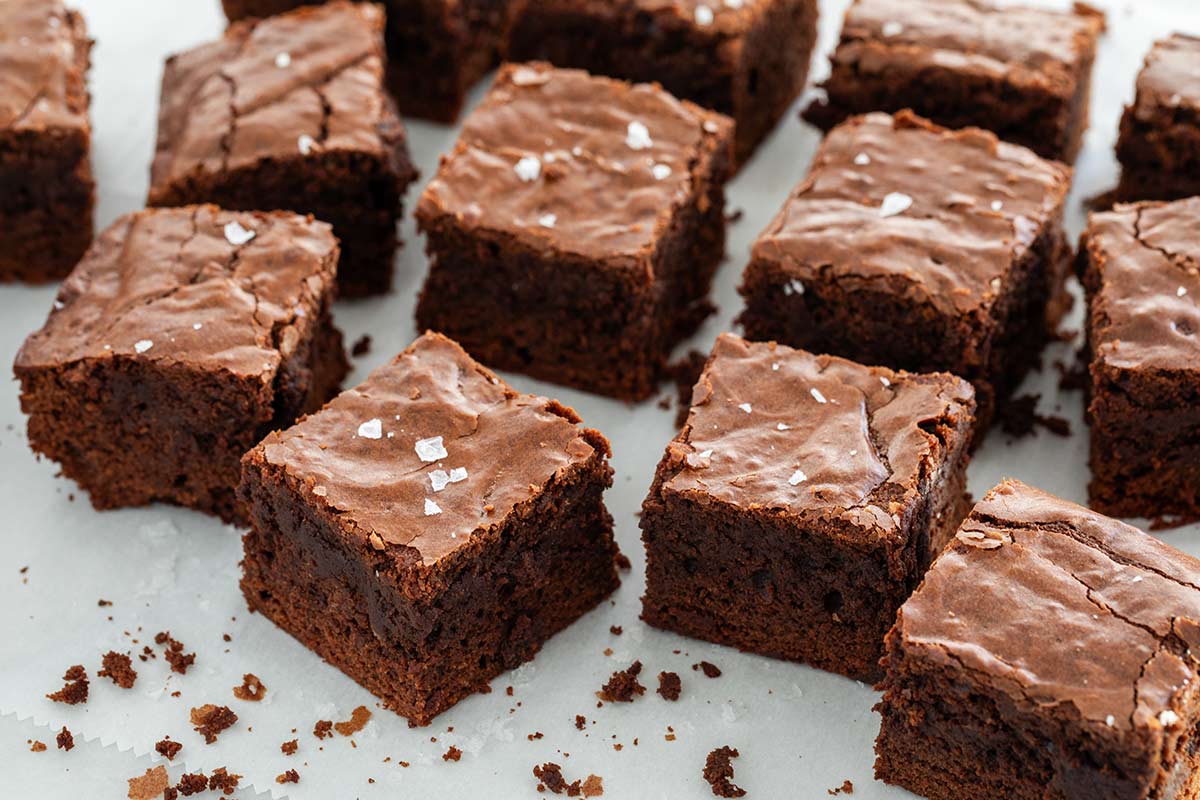 Homemade fudgy brownies cut into squares.