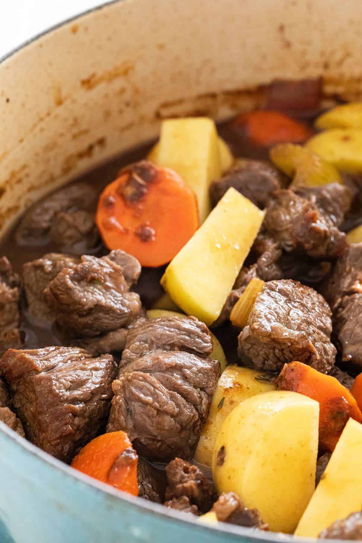 chunks of carrots, potatoes, and beef