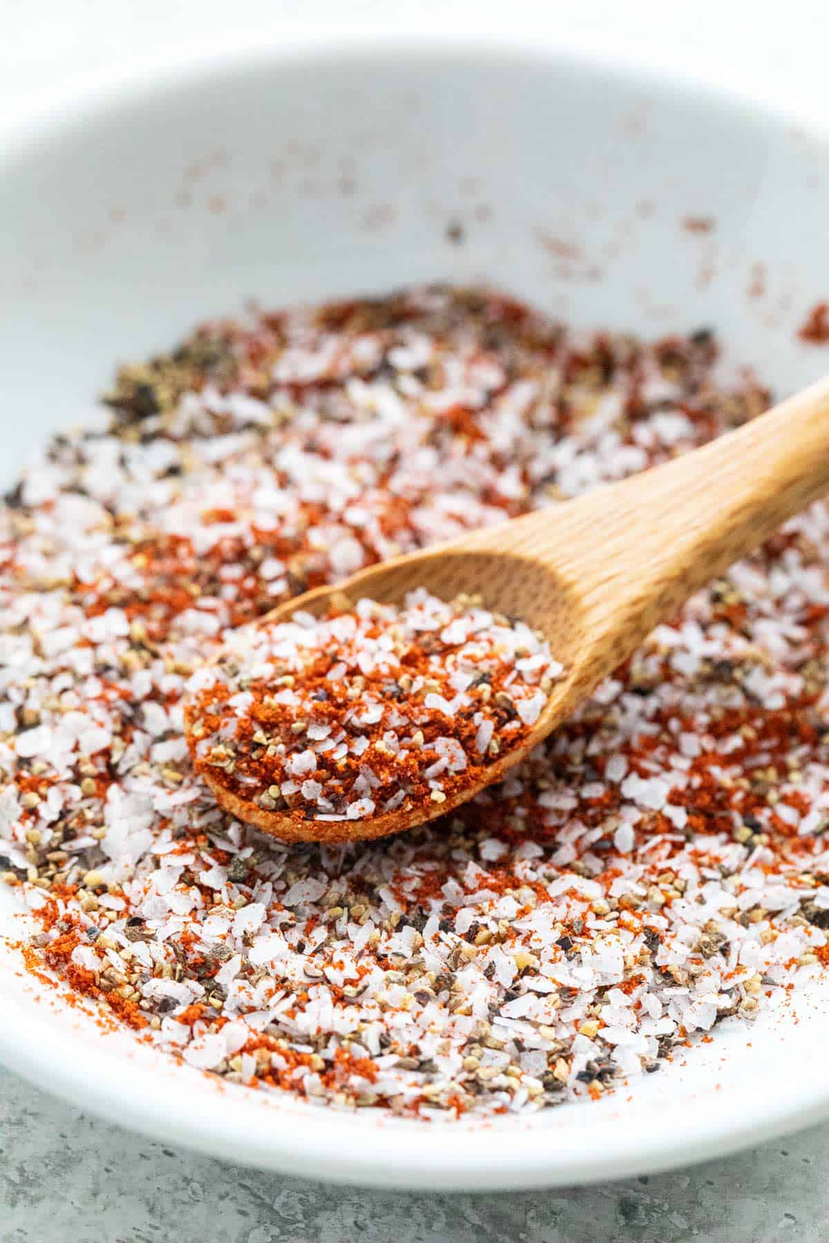 Shallow bowl with a blend of seasonings.