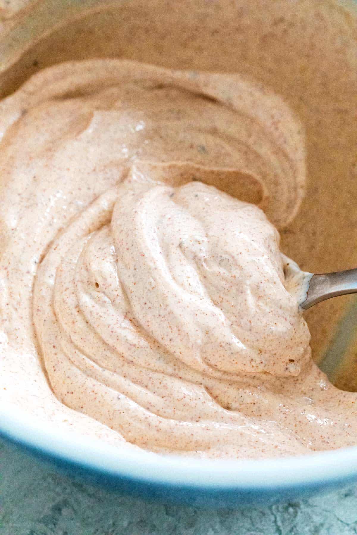 mixing taco seasoning with sour cream