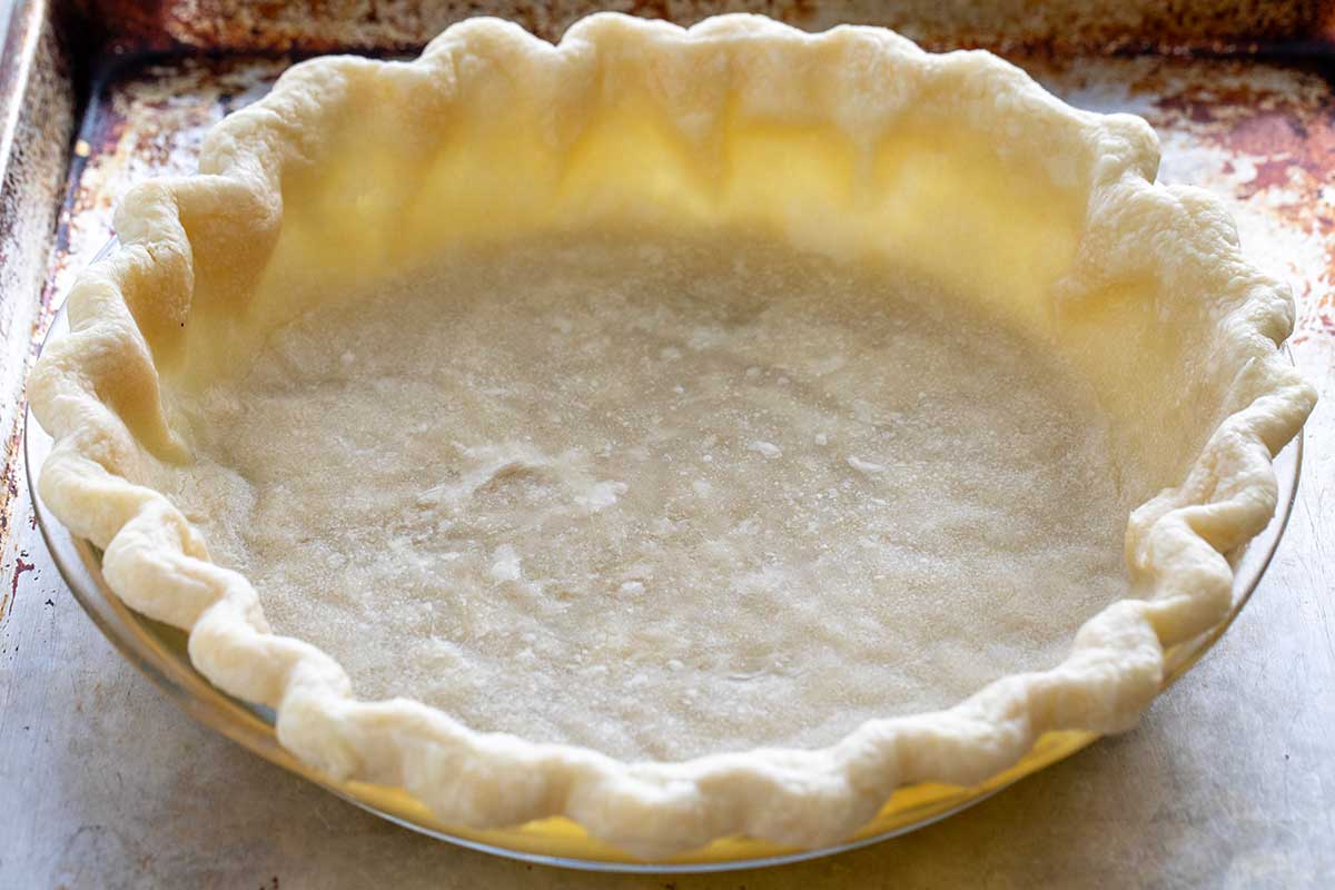 Partially baked pie crust shell.