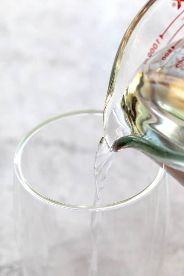 pouring hot water into a cup