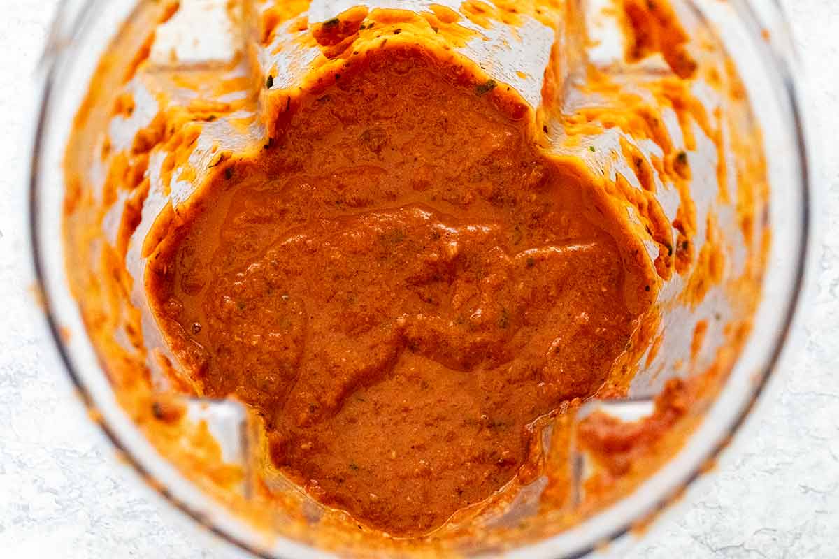 Pureed tomato sauce mixture in a blender cup.