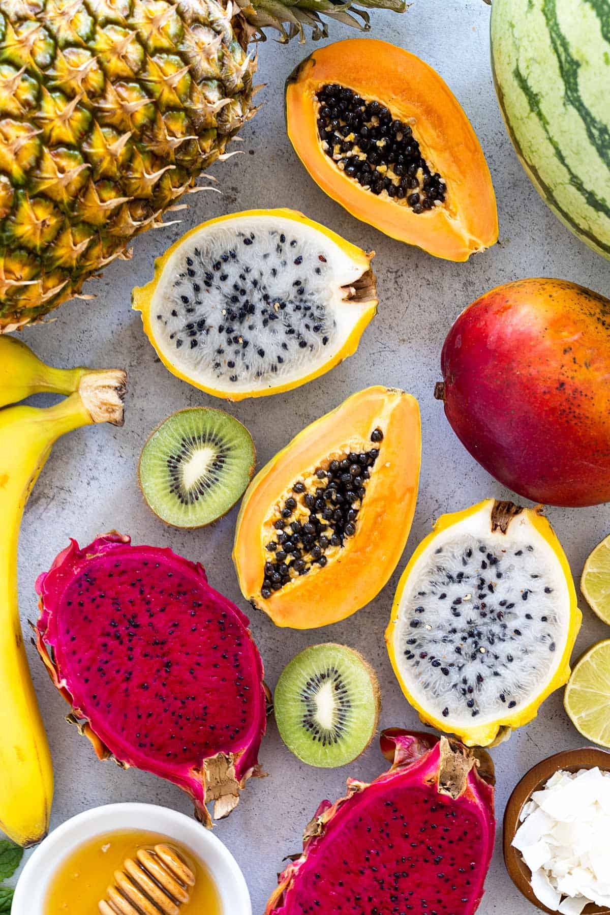 Various exotic fruits laid out on a table.