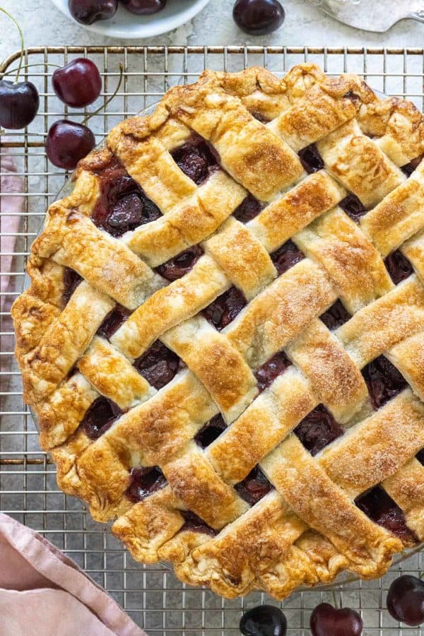 cherry pie on a cooling rack