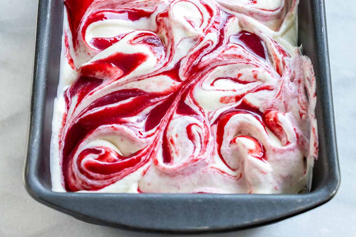 Raspberry swirl after mixing with a knife.