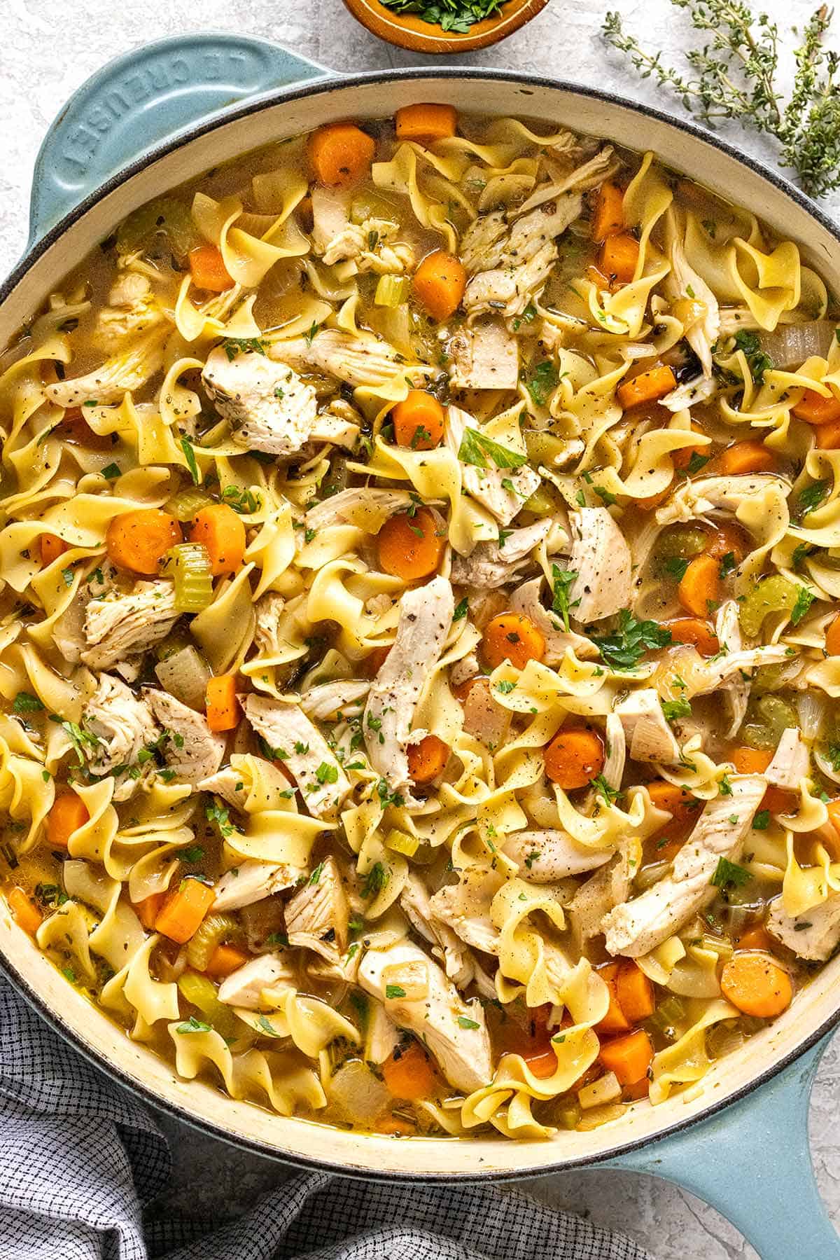Large pot of turkey noodle soup made from Thanksgiving leftovers.