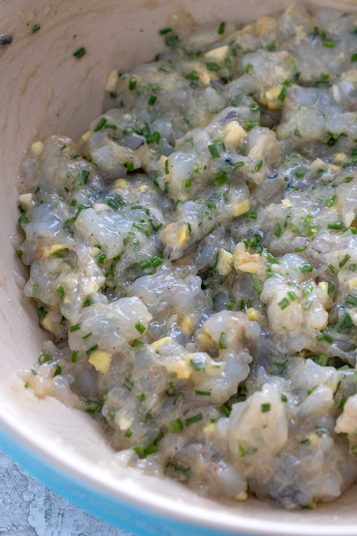 Bowl of shrimp dumpling filling.