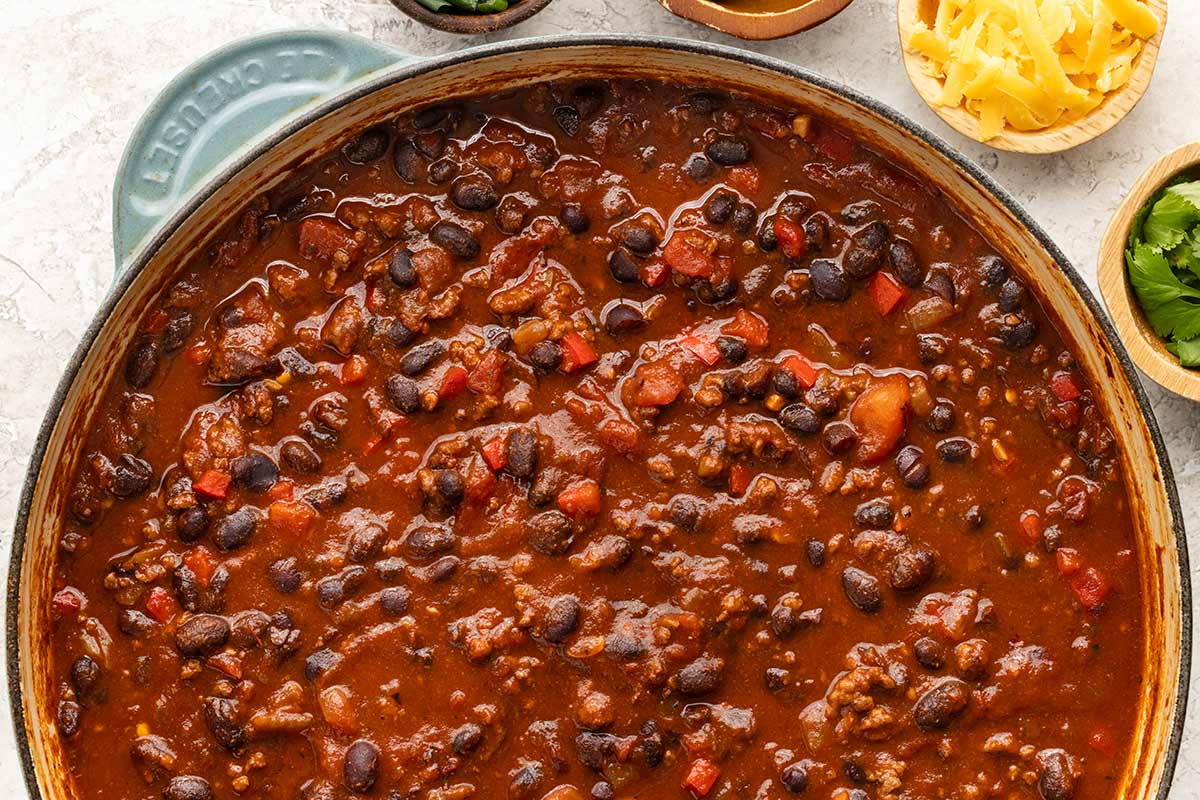 Large pot of chili made with black beans and ground beef.