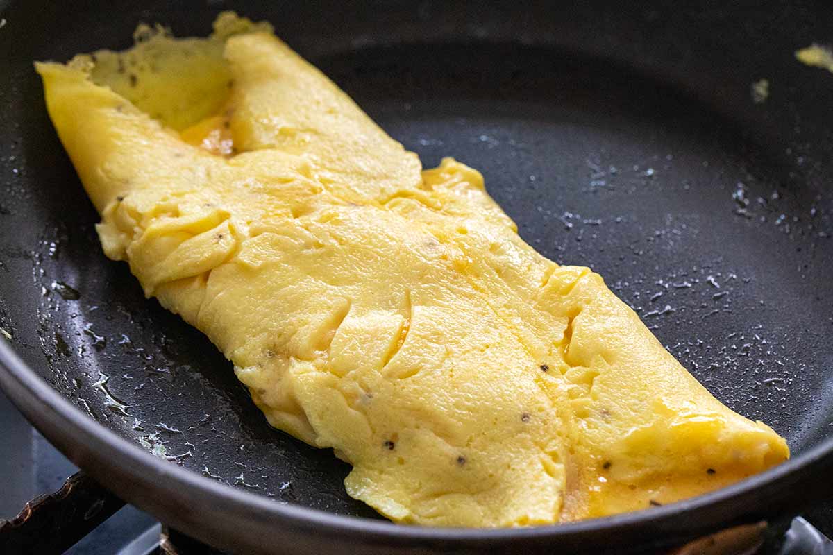 French omelette in a pan.
